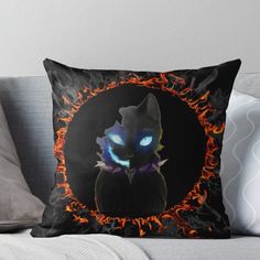 a black cat with glowing blue eyes on fire throw pillow