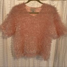 Never Worn Fuzzy, Pink Short Sleeve Sweater. Short, Slouchy Comfy Cut. Size M But Tends Toward Large. Check Measurements Below. Smoke-Free, Dog-Friendly Home (No Cats). Approx. Measurements (Not Stretched) Width Chest: 23" Overall Length: 20" Sleeve Length: 9" Check My Other Listings For More Fuzzy Sweaters! Fuzzy Sweater, Short Sleeve Sweater, Shrug Sweater, Short Sleeved Sweaters, Pink Shorts, Dog Friendly, Pink Sweater, Ponchos, Sleeve Sweater