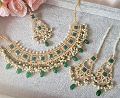 21K Gold Plated Necklace Set with lovely matching Earrings and Tikka Contrasted with bunch pearls and hanging beads in Emerald Green Handmade Bridal Sets For Wedding Festivities, Handmade Festive Bridal Sets For Wedding, Hand Set Green Bridal Earrings For Wedding, Handmade Chandbali Jewelry For Wedding, Handmade Chandbali Wedding Jewelry, Handmade Kundan Bridal Necklace For Reception, Handmade Gold Bridal Necklace For Reception, Traditional Handmade Jewelry For Reception, Handmade Wedding Jewelry For Diwali