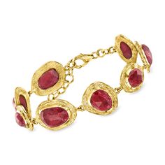 Ross-Simons - 20.00 ct. t. w. Ruby Bracelet in 18kt Gold Over Sterling. 7". Warm up your wardrobe with this well-priced ruby bracelet! 20.00 ct. t. w. oval rubies embrace an artsy look on the wrist from organic-shaped bordering stations. Finely crafted in textured and polished 18kt yellow gold over sterling silver. Includes a 1" extender. Lobster clasp, ruby bracelet. Ruby birthstones are the perfect gift for July birthdays. Gold And Red Bracelet, Ruby Bangle Bracelet In Yellow Gold, Yellow Gold Ruby Bangle Bracelets, Yellow Gold Ruby Bracelet, Gold Ruby Bracelet Fine Jewelry, Gold Ruby Bracelet In Fine Jewelry Style, Gold Oval Ruby Bracelets, Gold Ruby Bracelets Fine Jewelry, Oval Ruby Bracelet In Gold