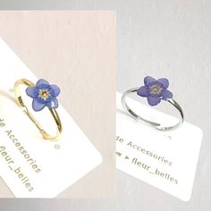 Thank you for visiting Fleur_Belles! The tiny real forget me not flower is pressed and coated with clear resin.  Forget me nots are symbolic of true love and remembrance making this ring perfect for gifting to a loved one or to wear in memory of somebody special. A lovely addition too for those who love dainty, minimal jewels. Ring size: adjustable with 1.8mm inner diameter as standard.  Real Flower Size: around 0.9cm 🌺Due to the handmade nature of this product, slight variations may occur, however, the design remains as similar as possible. 💖CARE about the handmade earrings💖 Please keep in a dry place and avoid prolonged direct sunlight, water, chemicals and perfumes to maintain and preserve the earrings beauty. Flower Shaped Ring With Pressed Flowers For Gift, Gift Flower Ring With Pressed Flowers, Adjustable Blue Flower Ring, Adjustable Blue Flower Ring For Gifting, Adjustable Blue Flower Ring Gift, Forget Me Not Ring, Crane Earrings, Flowers Ring, Flower Rings