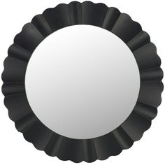 a round mirror on a white background