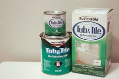 two cans of tub and tile paint next to each other