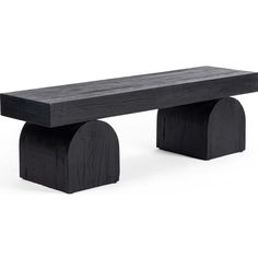 a black wooden bench sitting on top of a white floor next to a gray wall