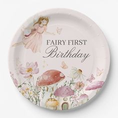 a paper plate with an image of a fairy and mushrooms on it that says,'fairy first birthday '