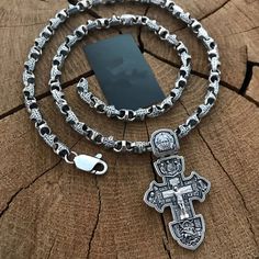 "The price is per set.  Original silver set! 1️⃣ Silver men's chain Art. 0204. ✔️Silver 925 with blackening ✔️Weight 59 grams ✔️Length 60 cm/ 23,6 inches ✔️Width 7 mm ✔️Carbine lock 2️⃣ Silver cross Art. 0133. Silver double-sided cross \"Crucifixion of Christ. Archangel Michael. Holy Trinity. St. blgv. book Alexander Nevskiy. Orthodox cross\" . ✔️Silver 925 with blackening ✔️Weight 13 grams (+- 1 grams) ✔️Size 55/32 mm ✔️Possible production in: 🟡Gold 14K or 18K (red, yellow, white) 🌕24K gold p Silver Cross Pendant Chain Jewelry, Silver Oxidized Cross Pendant Jewelry, Silver Crucifix Cross Necklace With Box Chain, Silver Cross Necklace With Box Chain, Silver Crucifix Cross Necklace With Chain, Engraved Silver Stainless Steel Cross Necklace, Silver Oxidized Crucifix Jewelry, Silver Crucifix Jewelry With Silver Chain, Cross Accessories