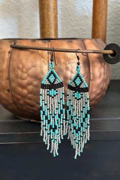 Beautiful Brick Stitch Earrings Using Toho Glass 11/0 Seed Beads Colors - Turquoise Blue, Black & Silver Length Of Earring (Not Including Earring Hook) - 4 Inches Width Of Widest Part - 1 Inch Beautiful & Fun Statement Earrings! Southwestern Tassel Earrings For Festivals, Traditional Beaded Earrings With Fringe For Festivals, Traditional Beaded Fringe Earrings For Festival, Southwestern Beaded Earrings With Tassels For Festival, Southwestern Fringe Earrings For Festivals, Handmade Turquoise Tassel Earrings For Festival, Turquoise Handmade Tassel Earrings For Festivals, Bohemian Fringe Chandelier Earrings As Gifts, Artisan Beaded Earrings With Tassels For Festival