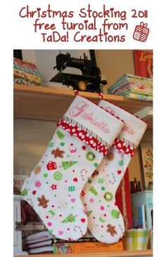 two christmas stockings hanging from a shelf in front of a sewing machine and bookshelf