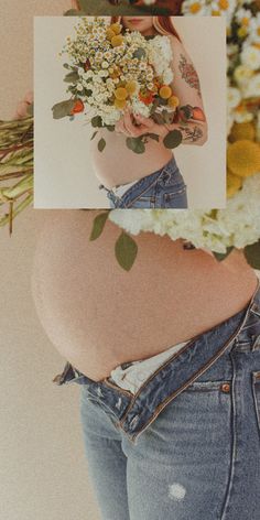 a pregnant woman with flowers on her belly