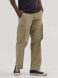 You can take everything with you whenever you wear our Men’s Ripstop Cargo Pant. Made to handle everything the day throws your way, these relaxed fit pants are as tough as they come. They’re crafted from a woven cotton fabric with just a hint of stretch. They feature a straight leg, roomy side pockets with extra compartments for essentials, back pockets, side pockets, a keychain belt loop, as well as a classic zip-fly and button closure. They won’t disappoint. Utility Pants Outfit Men, Men’s Cargo Pants Styles, Guys Cargo Pants Outfit, Loose Fit Pants Men, Men’s Pants, Cargo Pants Men Outfit, Mens Cargo Pants Outfit, Man Cargo Pants, Utility Pants Outfit