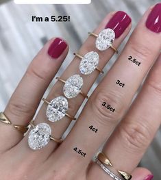 a woman's hand with five different engagement rings on it and the measurements for each ring