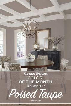 a dining room table with chairs and a chandelier hanging from the ceiling above it