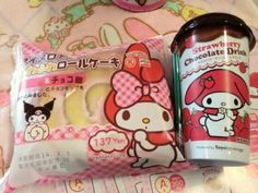 two hello kitty products are sitting on a bed