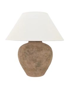 a brown vase with a white shade on it's side and a light on top