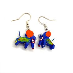 Alebrijes are brightly colored Mexican folk art sculptures of fantastical (fantasy/mythical) creatures! Crafted in Mexico by artisans using Mexican clay (known in Mexico as "barro"). Each unique earring set is hand-painted and meticulously decorated using a variety of colors. Details: Earrings • Each figurine is approximately 1/2" wide PLEASE NOTE: We want our customers to be happy with their purchase. Please be aware that each item is handcrafted and unique. We can offer the choice of main colo Unique Earring, Art Sculptures, Mexican Folk Art, Unique Earrings, Mythical Creatures, Handmade Earrings, Sculpture Art, Earring Set, Folk Art