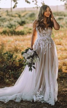 #boho #allwhowander #north #lace #romantic #tulleskirt #corsettop #doragracebridal #elopement Beach Vow Renewal, Wedding Dresses Spaghetti Strap, Boho Wedding Gowns, Amazing Wedding Dress, Boho Wedding Dresses, Floral Wedding Dress, Boho Wedding Dress Lace, Weddings By Color