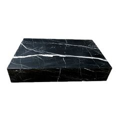 a black marble box on a white background