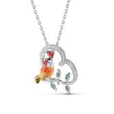 Designed for the free-spirited, the kingfisher is symbolic of freedom, courage, adventure, and balance. Each piece has been delicately hand-painted, displaying the uniqueness of its bright yellow feathers and orange plumage against a silver base. It is a true gift to spot one of these elusive creatures in nature.Carat Weight: 0.341 ctStone Size: 1,3*3,0.8 mmStone Type: Jeulia® StoneNumber of Stones: 44 Stone Shape: Round, HeartStone Color: Diamond White, Garnet RedChain Type: Cable chainWeight: Whimsical Bird Design Jewelry For Gifts, Whimsical Bird Design Jewelry For Gift, Handmade Bird-shaped Jewelry For Gifts, Handmade Bird-shaped Jewelry Gift, Hand Painted Nature-inspired Pendant Necklace, Nature-inspired Pendant Necklace With Hand Painted Details, Nature-inspired Hand Painted Pendant Necklace, Bird-shaped Bird-design Necklace For Gifts, Unique Bird Design Pendant Jewelry