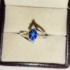 Blue Star Sapphire, 925 Sterling Silver, Lab 6 Rays Star Stone, Handmade Silver Ring, Blue Lindy  Sapphire Ring, Engagement Ring For Her # Gemstone : Blue Lindy Star Sapphire # Side Stone :Round CZ Diamonds # Color Grade : AAA # Gemstone Weight : 1.70 Carat # Gemstone Size : 6 × 8 mm  # Metal : 925 Sterling Silver # All Size Available. # Links : #Check out my shop- https://www.etsy.com/in-en/shop/Ayushjewellersjaipur?ref=seller-platform-mcnav Thanks For Visit Our Store  If you want to personal it in your own way message us!! We always believe in customer satisfaction and serve you best of our ability. so if you have any concern request you to connect us through Etsy message will do our best to resolve it Blue Sterling Silver Star-shaped Ring, Sapphire Ring Engagement, Sapphire Side Stones, Silver Lab, Blue Star Sapphire, Handmade Silver Ring, Diamond Color Grade, Engagement Ring For Her, Star Sapphire