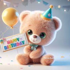 a teddy bear holding a happy birthday sign