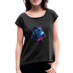 a woman wearing a black shirt with a blue dog on it