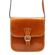 BROWN VINTAGE STYLE CROSSBODY HANDBAG! A small handbag made of top-quality Italian natural grain leather. The leather is tanned and dyed using only natural tannins and dyes of vegetable and mineral origin. The dyeing of the leather is done by hand in a process called 'tamponato', which gives it a characteristic shading effect. The handbag has the classic shape of a satchel and a single-compartment construction. The compartment is equipped with a pocket closed with a zipper. The entire bag is clo Vintage Crossbody Shoulder Bag For Business, Classic Shoulder Bag With Coin Pocket For Everyday, Classic Everyday Shoulder Bag With Coin Pocket, Vintage Cognac Crossbody Bag, Vintage Soft Leather Shoulder Bag For Gift, Classic Brown Shoulder Bag As Gift, Classic Brown Shoulder Bag Gift, Classic Brown Shoulder Bag For Gift, Brown Crossbody Shoulder Bag With Coin Pocket