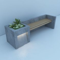 a concrete bench with a plant in it