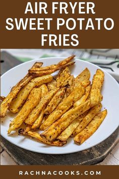 cooked french fries on a white plate