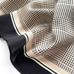 Upgrade your accessory collection with this elegant silk neckerchief scarf, featuring a timeless black houndstooth pattern on a sophisticated beige base. Crafted from 100% silk, this versatile scarf is designed for both women and men, offering a luxurious and smooth feel for any season. The classic black houndstooth pattern makes this scarf a chic statement piece, perfect for adding a touch of refinement to casual or formal outfits. Whether worn as a neck scarf, headscarf, or tied to a handbag, Elegant Black Square Silk Scarf, Black Silk Scarf For Work, Classic Black Silk Scarf For Work, Beige Color Palette, Pattern Weights, Silk Scarf Hair, Silk Neck Scarf, Silk Bandana, Silk Square Scarf