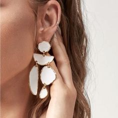 White Dangle Drop Earrings Trendy White Metal Earrings, Trendy Single White Earring, Trendy White Single Earring, Chic White Metal Earrings, Trendy White Drop Earrings, Modern Single White Earring, Chic Single White Earring, Chic White Single Earring, White Chic Dangle Chandelier Earrings