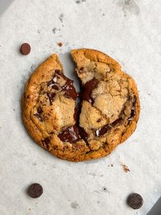 a chocolate chip cookie with one bite taken out