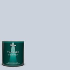 a can of marquee paint on a dark green background