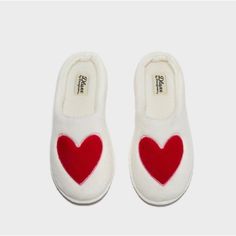 Dluxe By Dearfoams Ladies Plush Heart Slippers - White W/Red Heart 5/6 New With Tags! Dluxe By Dearfoams Ladies Size Small White Plush Slippers With Big Red Hearts On Them And A Pink Embroidered Outline These Heart Slippers Are Perfect For The Lady You Love, For A Daughter Or For Valentines Day! Very Comfortable And Have Memory Foam Inside Brand New In Package Plush Terry Upper With Emboridered Valentine's Day Details. Flannel Lining And Plush Terry Sock. Machine Washable For Long Lasting Freshness. Cushioned Insole With Memory Foam Comfort. Easy On/Off Silhouette With Non Skid Red Tpr Outsole. Listed As 5.5 Because They Are 5/6 Small Please Take A Look In My Closet For Other Items You' Love For A Daughter, Heart Slippers, Dearfoam Slippers, Cat Slippers, Grey Slippers, White Slippers, Bear Slippers, Indoor Outdoor Slippers, Plush Slippers