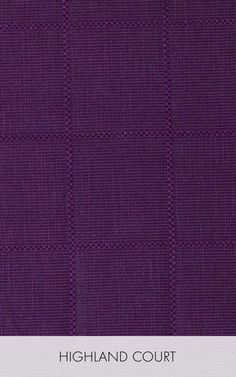 the purple fabric is very soft and has small squares on it, as well as an inscription