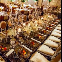 a long table is set up for a formal dinner