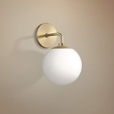 an image of a white ball light on the wall in a living room or bedroom