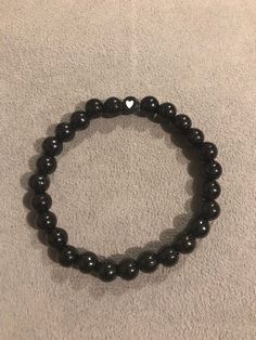 Simple black beaded bracelet finished with a heart bead. Black Bracelet Ideas, Amanda Knight, Black Beads Bracelet, Black Beaded Bracelet, Black Beaded Bracelets, Black Hearts, Black Bracelet, Black Bracelets, Bracelets Handmade Beaded