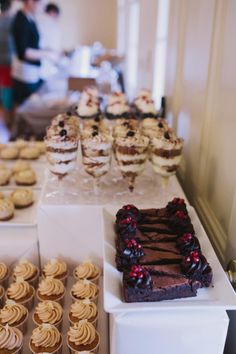 desserts and pastries are on display at the reception