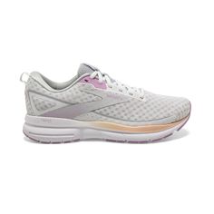 a women's running shoe in white and pink