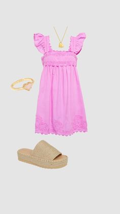 a pink dress and sandals on a white background with a gold necklace, bracelets and ring