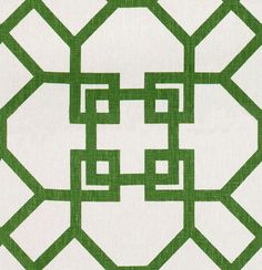 a green and white pattern on fabric