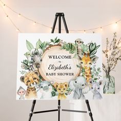 an easel with a baby shower sign on it