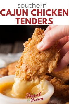 someone dipping something into some kind of fried chicken tenders in a small white bowl