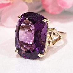 13.00 Carat Natural Amethyst 14k Solid Gold Ring Ring Material: 14k Solid Gold  Ring Approximate Weight: 4.5 Grams  Gemstone: Natural Amethyst Gemstone Treatment: Heating  Gemstone Color: Purple Gemstone Clarity: Eye Clean  Gemstone Shape: Cushion Gemstone Approximate Dimensions: 18.00x13.00mm Gemstone Approximate Carat Weight: 13.00 Carat Gemstone Quantity: 1 Ring Quantity: One  Condition: New Made in Los Angeles, CA Delivered in an elegant jewelry box 💜 Please do not hesitate to ask any quest Solid Gold Ring, Amethyst Gold, Amethyst Color, Classic Jewelry, February Birth Stone, Yellow Gold Ring, Amethyst Gemstone, Ring Ring, Elegant Jewelry