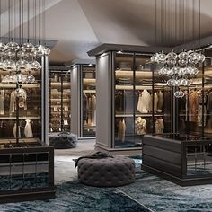 a room filled with lots of closets and chandelier hanging from the ceiling