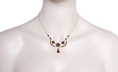 This beautiful Victorian bohemian garnet drop necklace is absolutely regal! It features fiery round rose cut natural red garnets set into secure prong settings, in lustrous 18 karat yellow gold vermeil over sterling silver. The center large garnet flower is framed by two smaller garnet flowers adorned with curved garnets set swaths. A garnet cluster drop dangles from the large center garnet flower, completing the elaborate presentation. Measures 16 inches. This exceptional necklace is perfect fo Garnet Necklace, Teardrop Necklace, Art Deco Jewelry, Drop Necklace, Red Garnet, Natural Red, Rose Cut, Gold Vermeil, Prong Setting