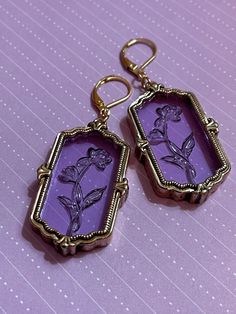 "These timeless beauties are just perfect! The beautiful purple glass catches the light effortlessly highlighting the beautifully etched roses.  For some reason I'm reminded of beauty and the beast when I look at them, just a timeless classic simple beauty. Matching Pendant on light gold plated gorgeous 16\" filigree chain now available?in drop down menu!" Purple Brass Drop Earrings, Purple Brass Jewelry With Matching Earrings, Vintage Rose Gold Tarnish Resistant Jewelry, Purple Brass Earrings As Gift, Vintage Jewelry With Lever Back, Vintage Lever Back Drop Earrings, Vintage Lavender Jewelry, Vintage Lever Back Earrings As Gift, Brass Jewelry With Lever Back For Gift