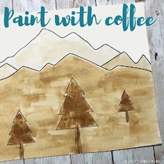 a piece of paper with trees painted on it and the words paint with coffee written in blue