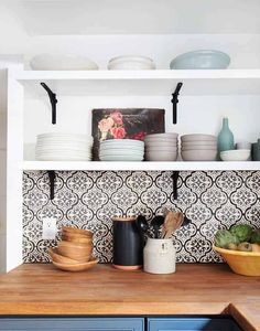 the kitchen counter is clean and ready to be used as a place for cooking or eating