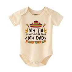 Get ready to laugh with our Funny Tia Baby bodysuit! Keep your little one cooler than their dad in this hilarious, yet stylish shirt. A perfect gift for any cool aunt, this bodysuit is sure to bring humor to your baby's wardrobe. Get yours today! Keywords : Funny Tia(Aunt) Baby bodysuit, Cooler than my Dad shirt, Cool Aunt Baby clothes, Baby humor, Funny Baby gifts, Baby apparel, Baby clothing, Baby fashion, Baby attire, Cute baby outfit, Baby shower gift, Humorous baby clothes, Aunt-themed baby bodysuit, Parenting, Baby humor, Funny baby outfit, Baby gift, Cool aunt baby apparel, Baby fashion, Auntie humor, Funny baby bodysuit, Cool auntie baby clothes, Baby humor, Auntie-themed baby wear Newborn Baby bodysuit, baby shower, Newborn Clothes, Pregnancy announcement, baby announcement, gift Funny Aunt Shirts For Babies, Auntie Baby Clothes, Aunt Baby Clothes, Baby Humor, Aunt Baby, Auntie Baby, Baby Aunt, Funny Baby Gifts, Ivf Baby